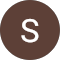 A brown circle with the letter s in it